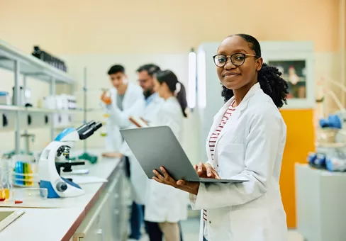 Paint formulators at work in a lab