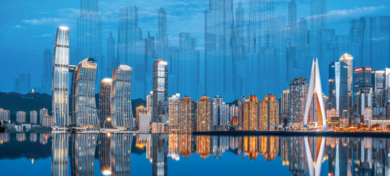 Cityscape and skyline of downtown near water of Chongqing at night