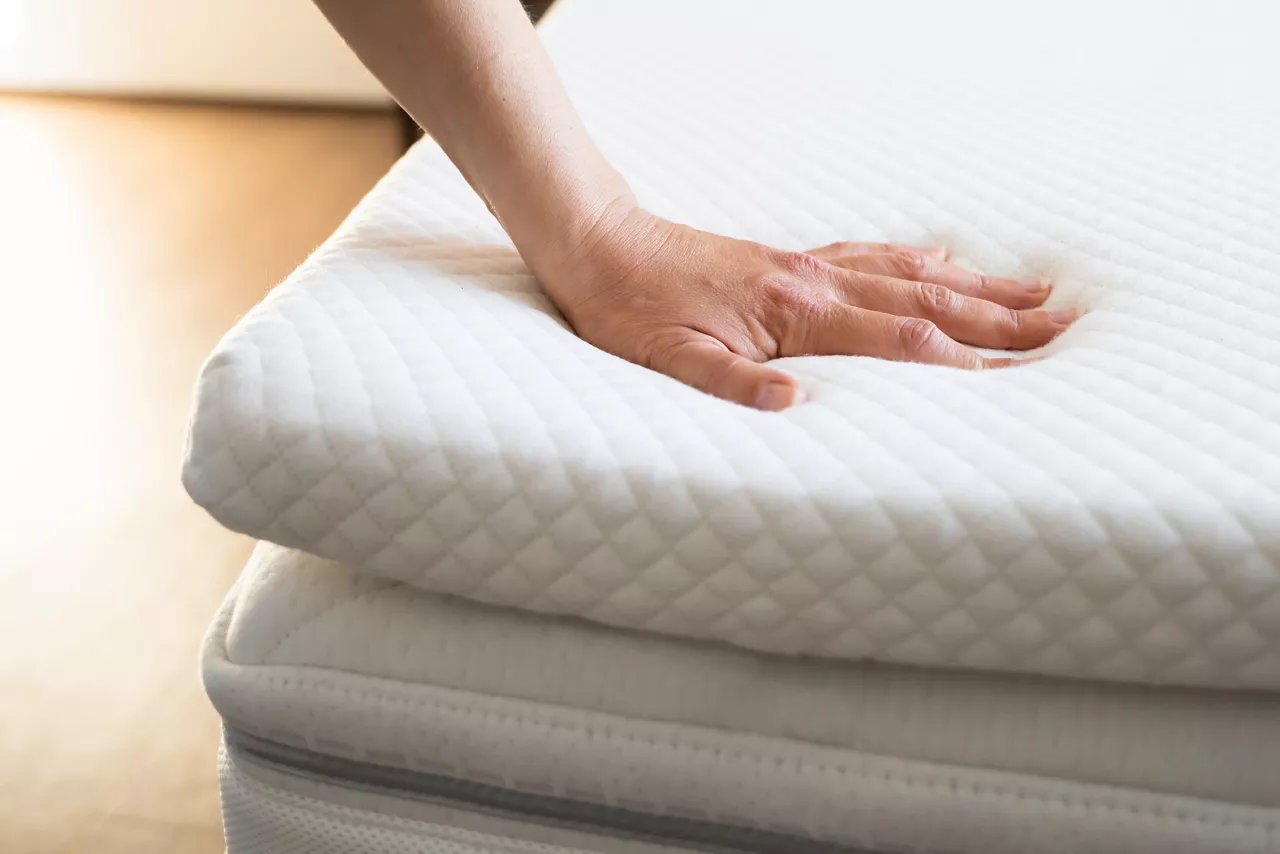 Hand print on foam bed mattress 