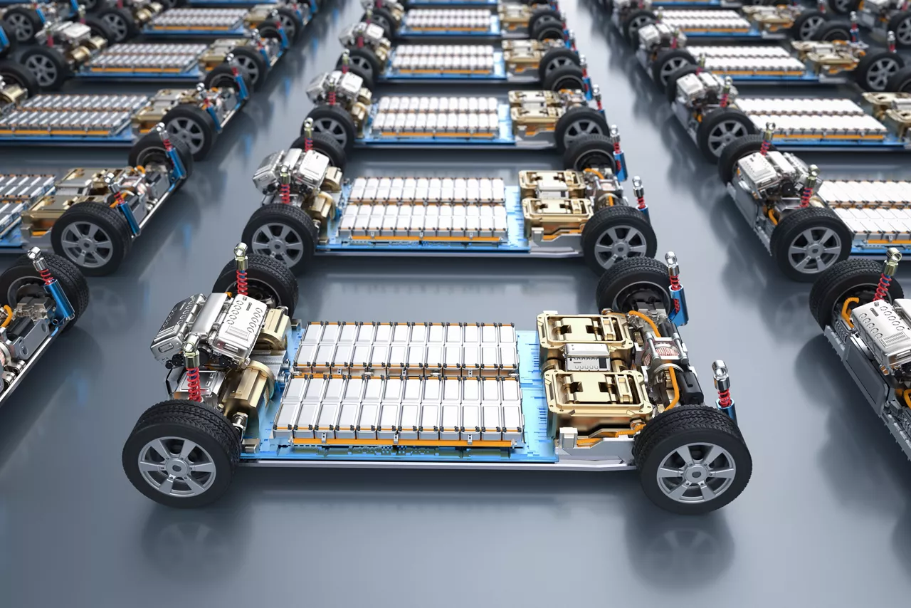 Group of electric cars with pack of battery cells module on platform