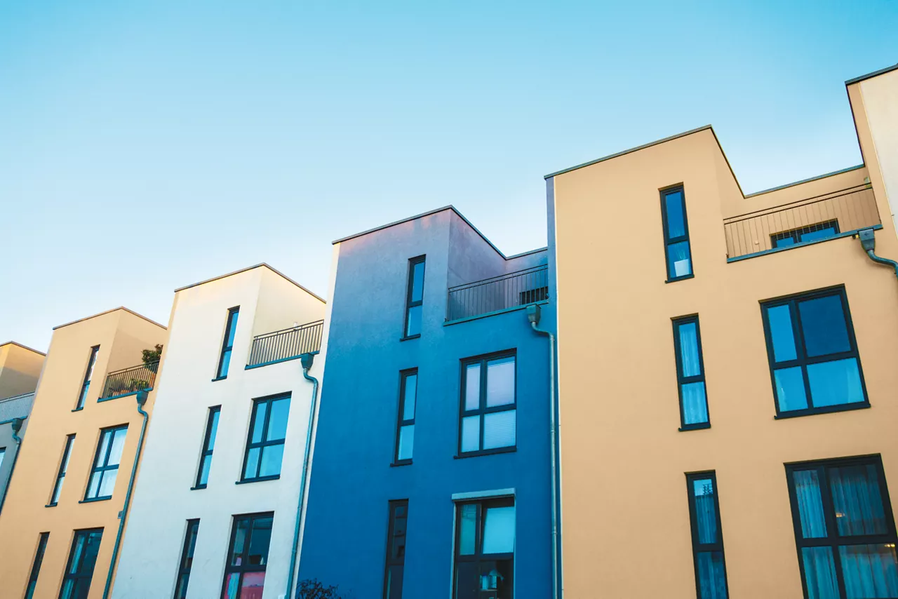 beautiful colorful modern townhouses with clean sky