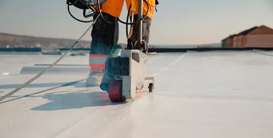 Waterproofing and insulation at construction site, waterproofing membrane preventing water penetration. Exterior vapor barrier for roof