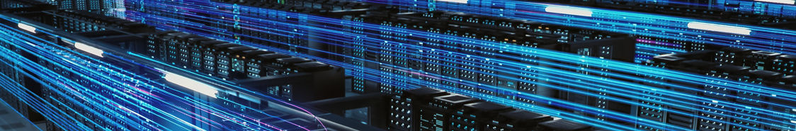 Big data center female chief technology officer using laptop standing in warehouse, activates servers