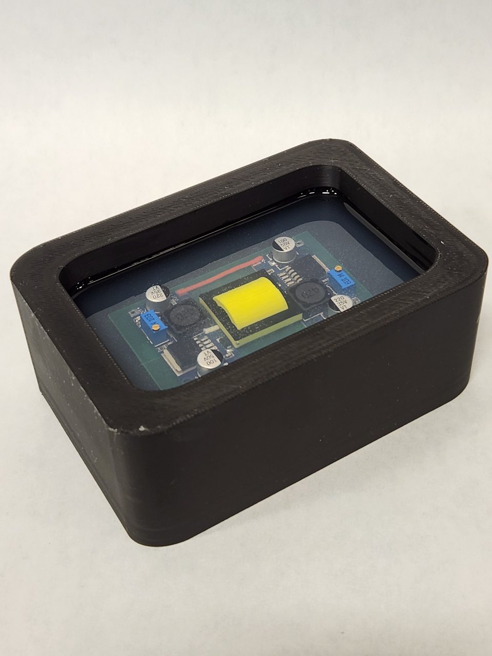 DOWSIL™ OR-2000 Standard Hard Gel potting a mock board.