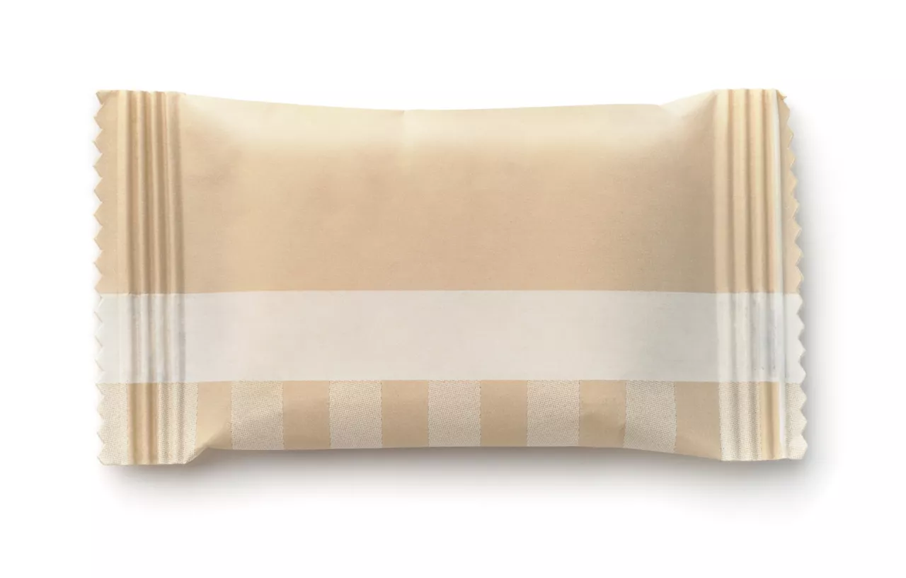 Top view of brown paper sachet isolated on white