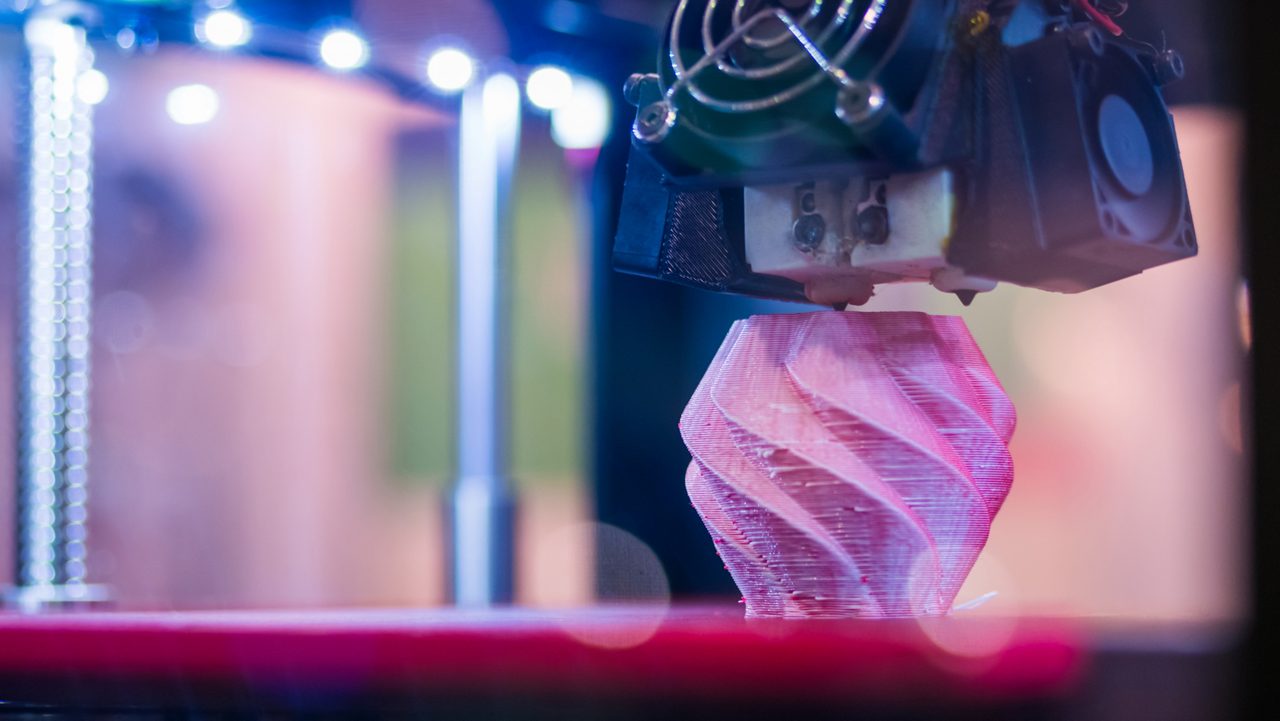 Print head of 3D printer machine printing plastic model at modern scifi technology exhibition. 3D printing, additive technologies, 4.0 industrial revolution and futuristic concept
Modern 3D printer machine printing plastic model