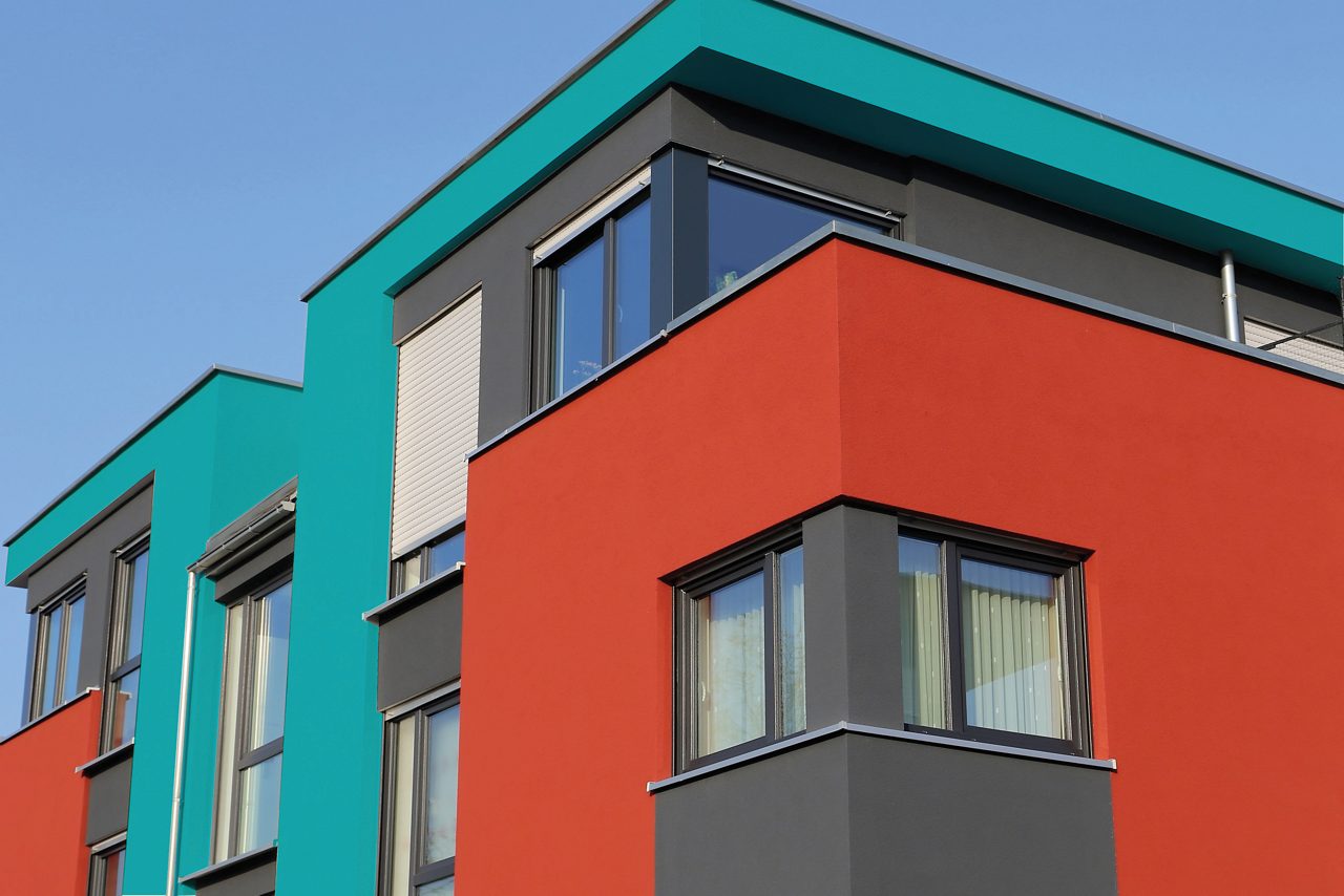 Image of colorful outer wall of modern residential building.