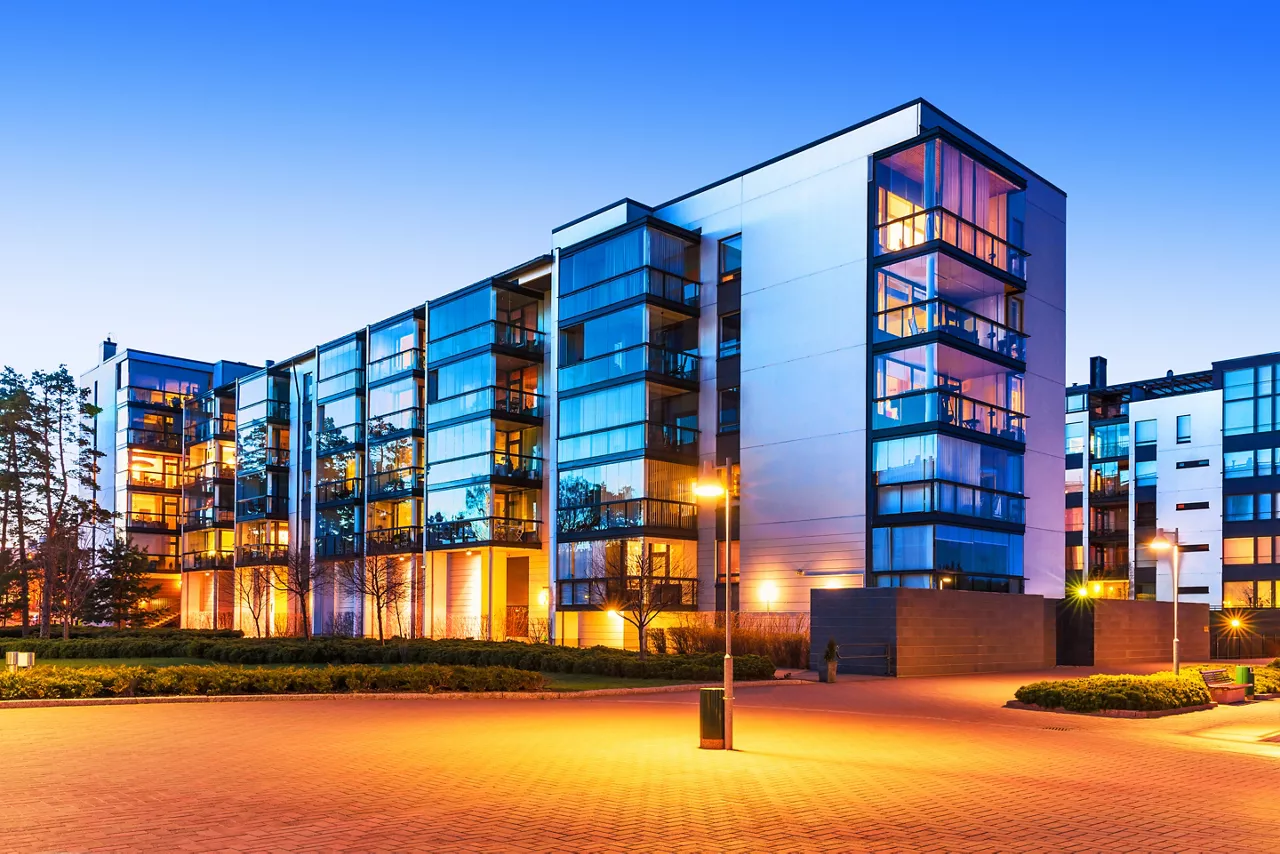 House building and city construction concept: evening outdoor urban view of modern real estate homes; Shutterstock ID 213775522