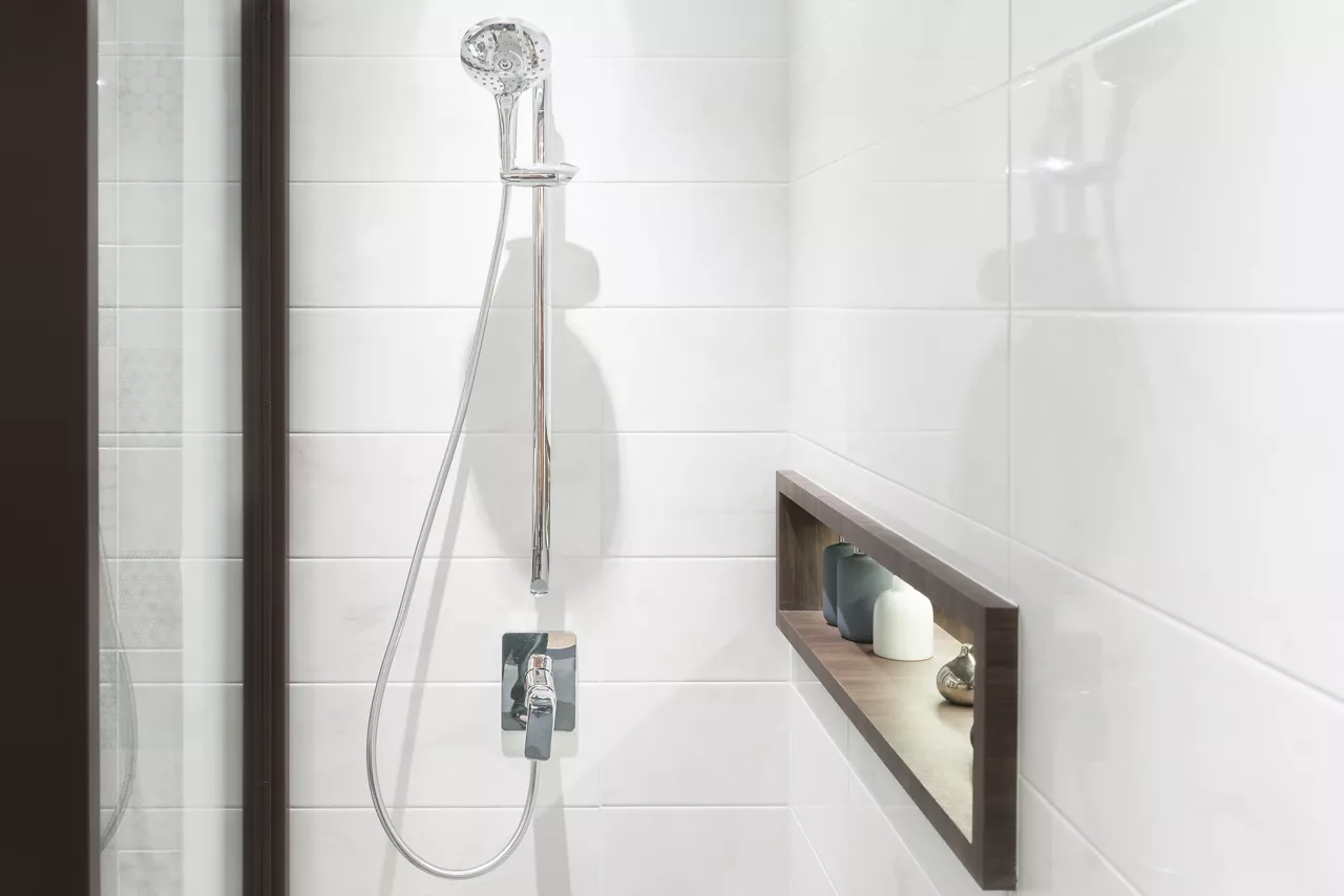 Interior of modern shower in bathroom at home