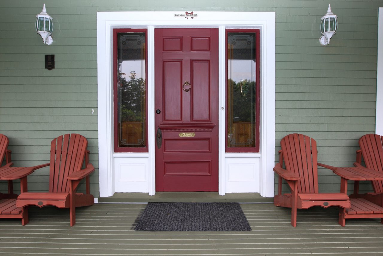 Porch with wooden chairs